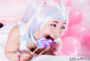 Minano Ai on her knees sucking lolipop and cock